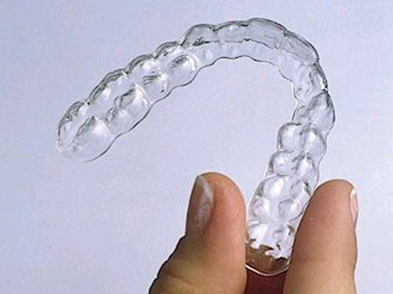 Plaque transparente pour aligner les dents Un exemple de plateau pour les dents
